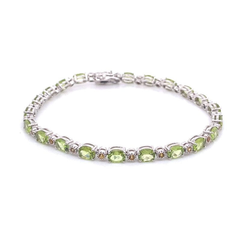 Bracciale in oro con peridodo e brillanti Cognac <br><h6>BR-046</h6>