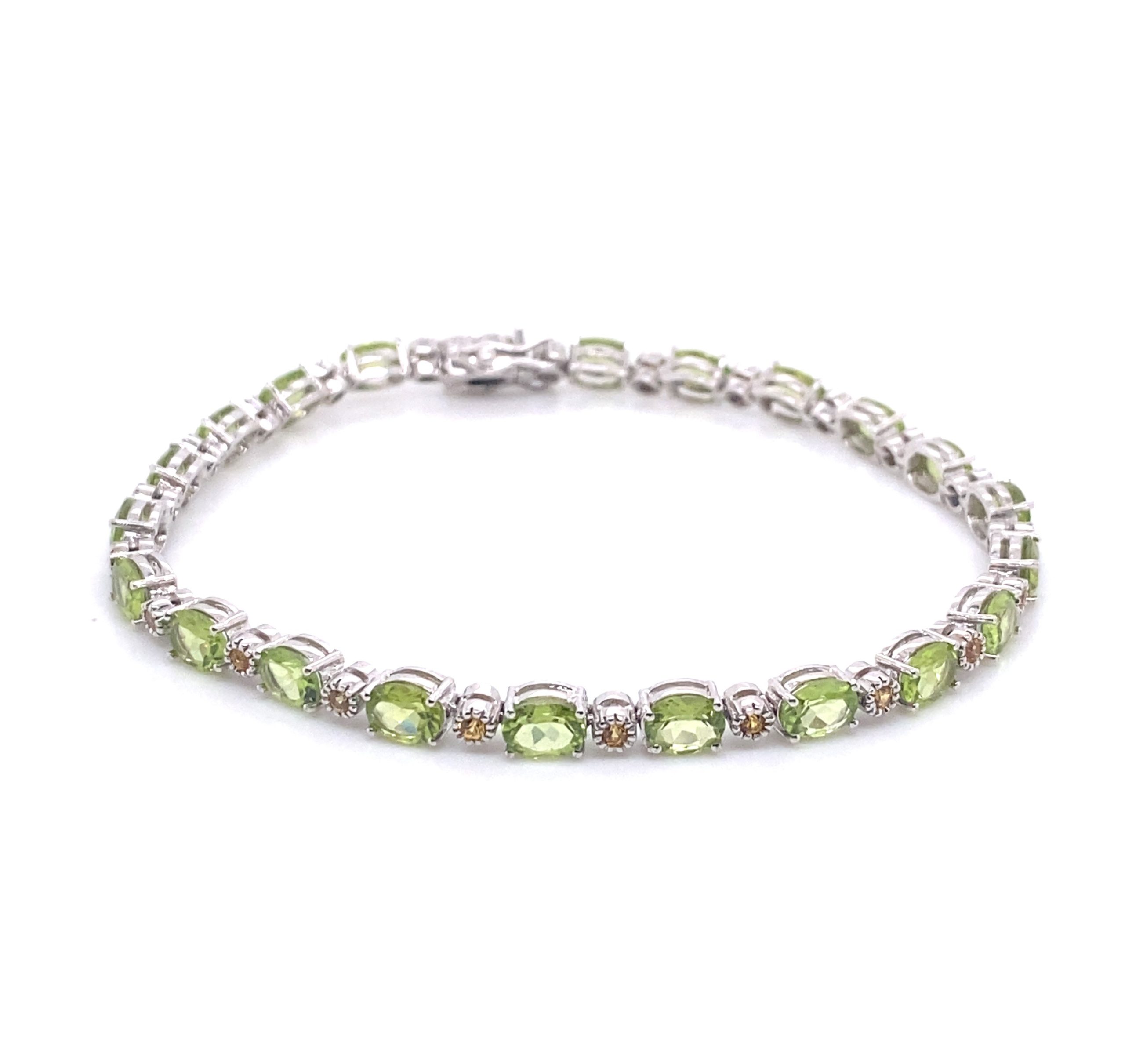 Bracciale in oro con peridodo e brillanti Cognac <br><h6>BR-046</h6>