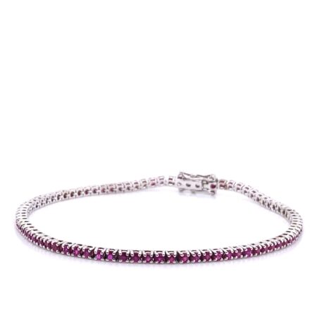 Bracciale in oro bianco e rubini <br><h6>TENNIS-FILO</h6>