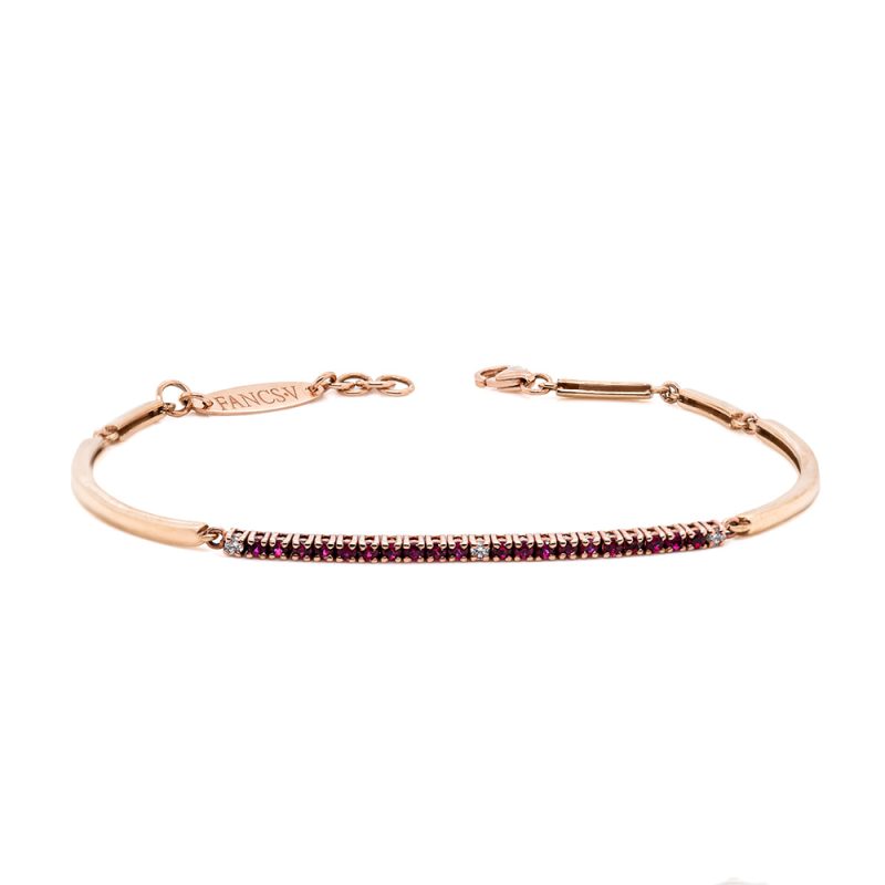 Bracciale tennis in oro 18 carati con rubini carati