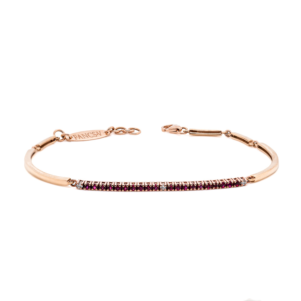 Bracciale tennis in oro 18 carati con rubini carati