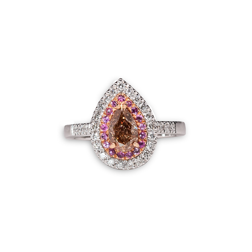 Anello in oro con zaffiri rosa, diamante centrale e diamanti laterali <br><h6>ANF-440</h6>