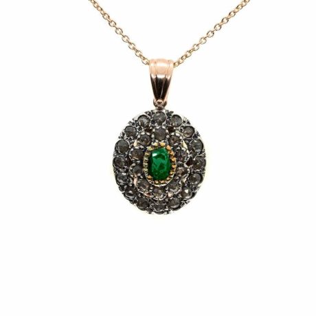 Pendente in oro e argento con diamanti e smeraldo