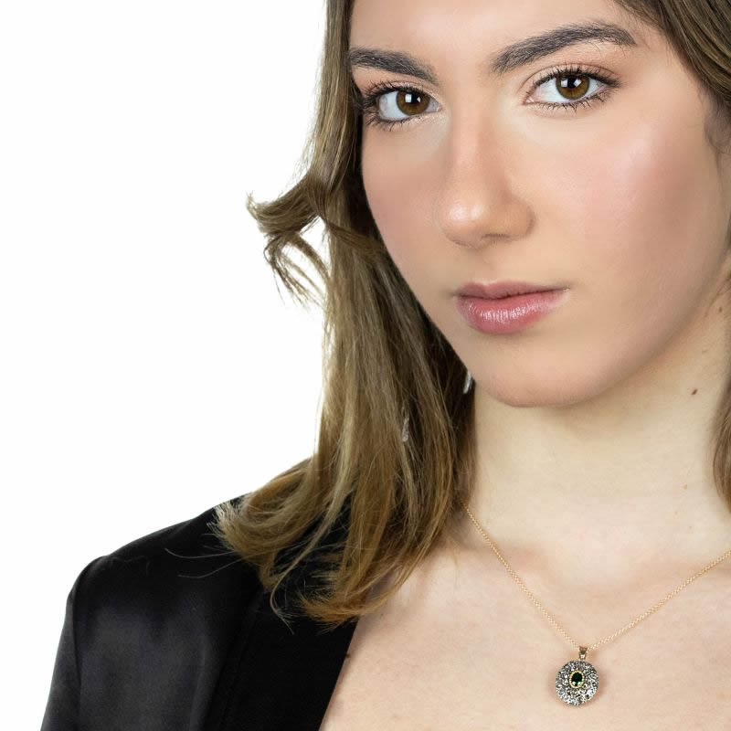 Pendente in oro e argento con diamanti e smeraldo