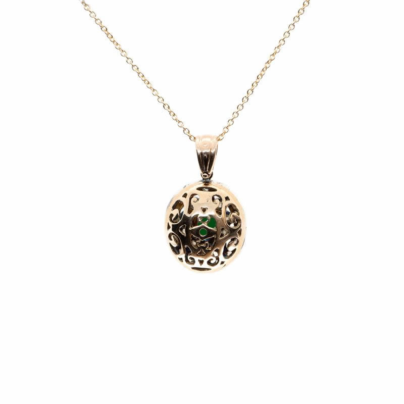 Pendente in oro e argento con diamanti e smeraldo