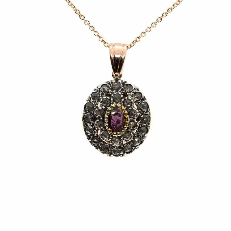 Pendente in oro e argento con diamanti e rubino