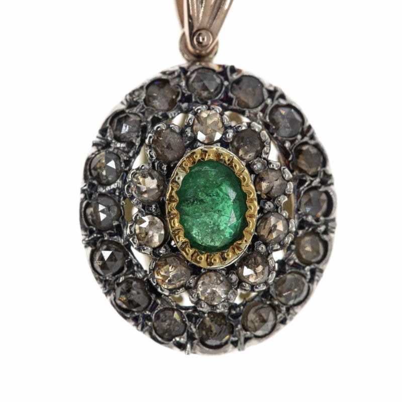 Pendente in oro e argento con diamanti e smeraldo