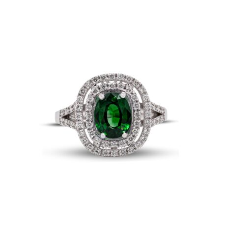 Anello in Oro Bianco 18 carati incastonato con Brillanti 0,51 carati e montato con Smeraldo 1,06 carati.