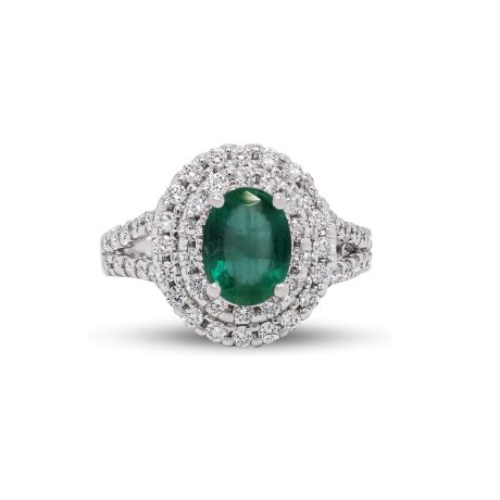 Anello in Oro bianco 18 carati incastonato con Diamanti 0,68 carati, montato con Smeraldo centrale 0,90 carati