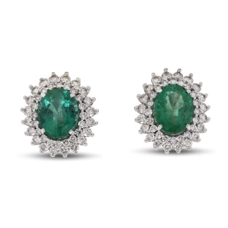Orecchini in Oro bianco 18 carati incastonati con Diamanti 1,34 carati e Smeraldi 3,40 carati