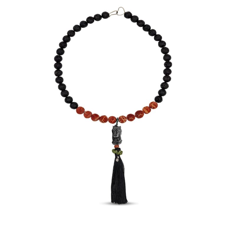 Collana con pietra lavica e madrepora con ciondolo di testa di moro in argento 925 e pietre semipreziose.Collana con pietra lavica e madrepora con ciondolo di testa di moro in argento 925 e pietre semipreziose.